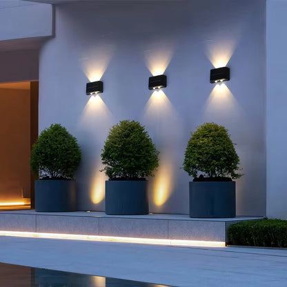 Energy-efficient LED solar outdoor wall light - in use